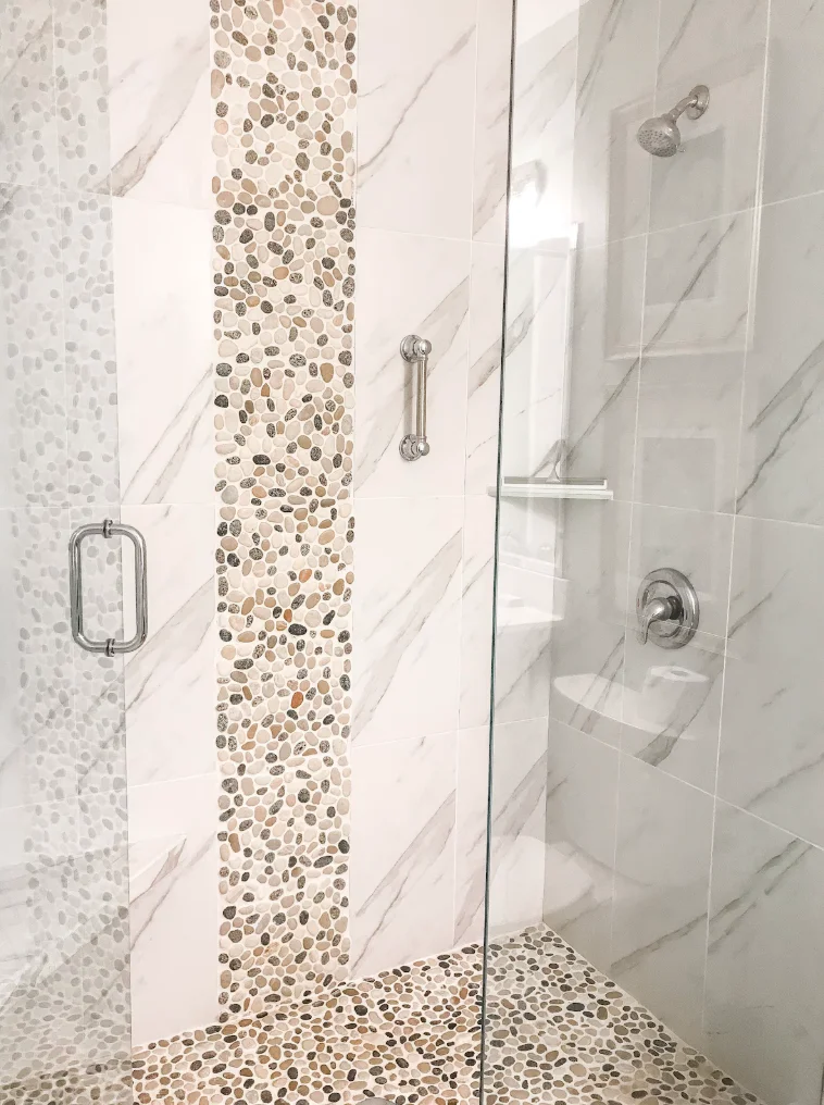 The primary bathroom includes a newly remolded walk in shower