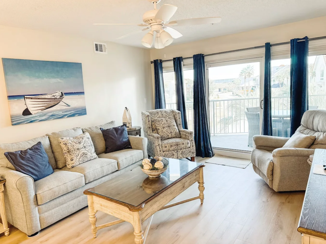 The living area with comfortable seating & large Smart TV.