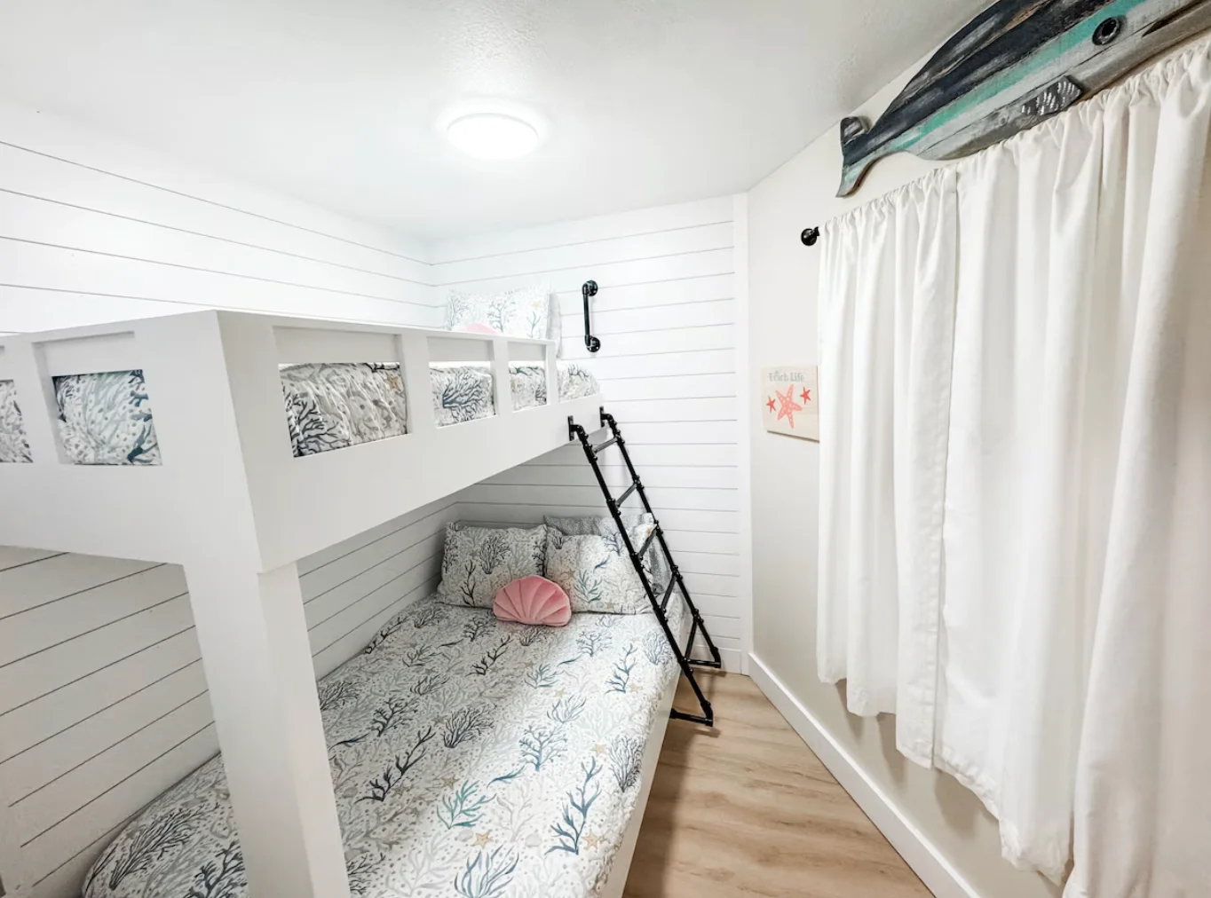 The third bedroom features a bunk bed (full size on bottom, twin size on top)