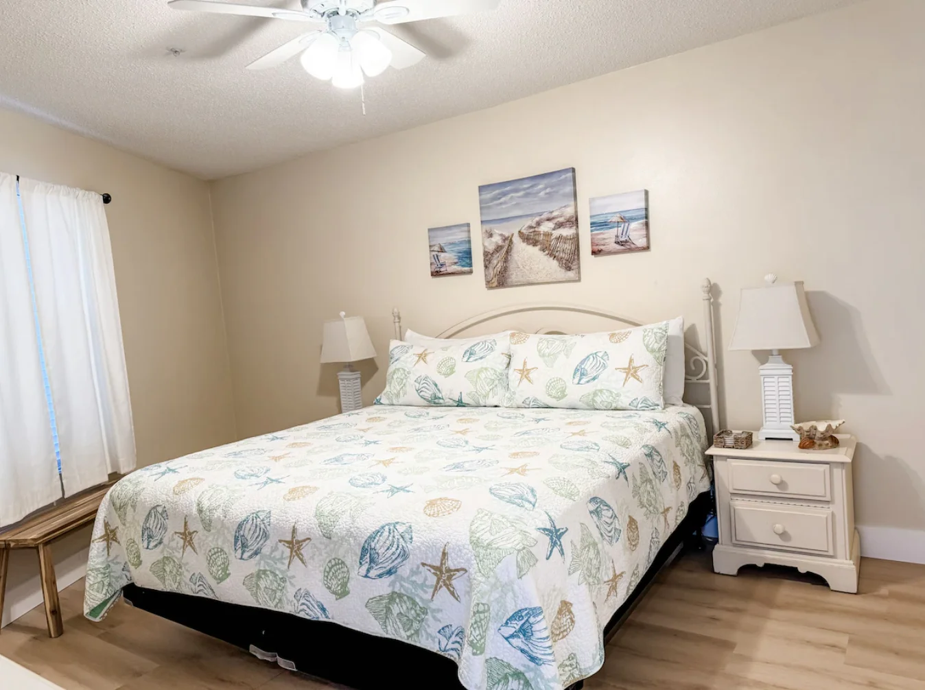 Guest bedroom features a king size bed and an en suite bathroom