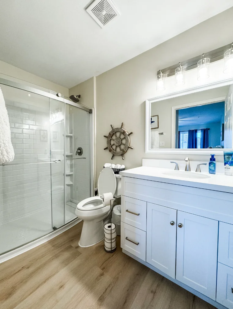 Newly remodeled primary bathroom features a walk in shower