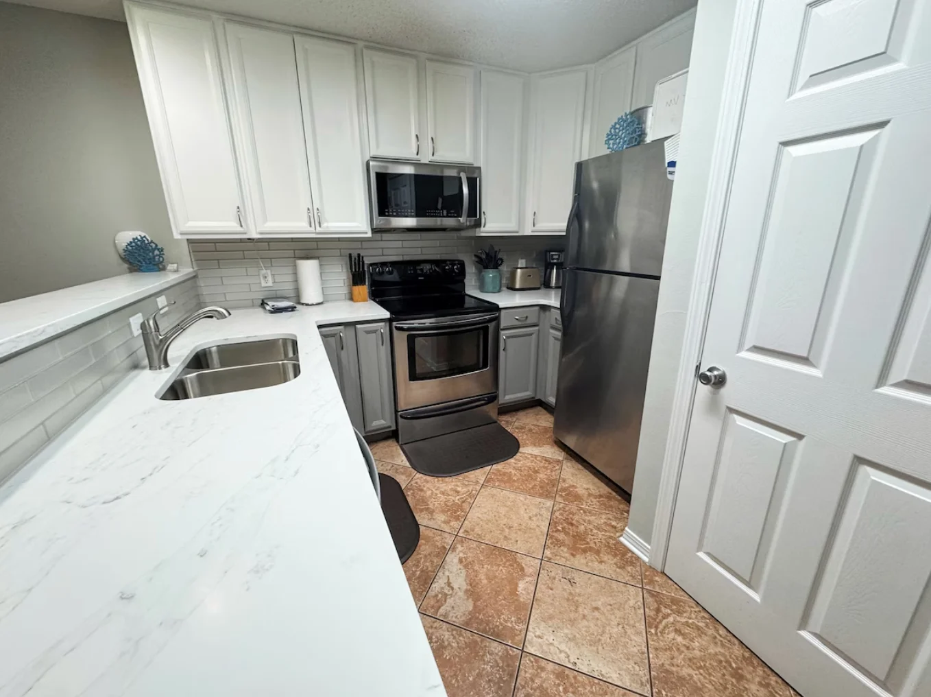 There is also a washer and dryer in the closet pictured here in the kitchen