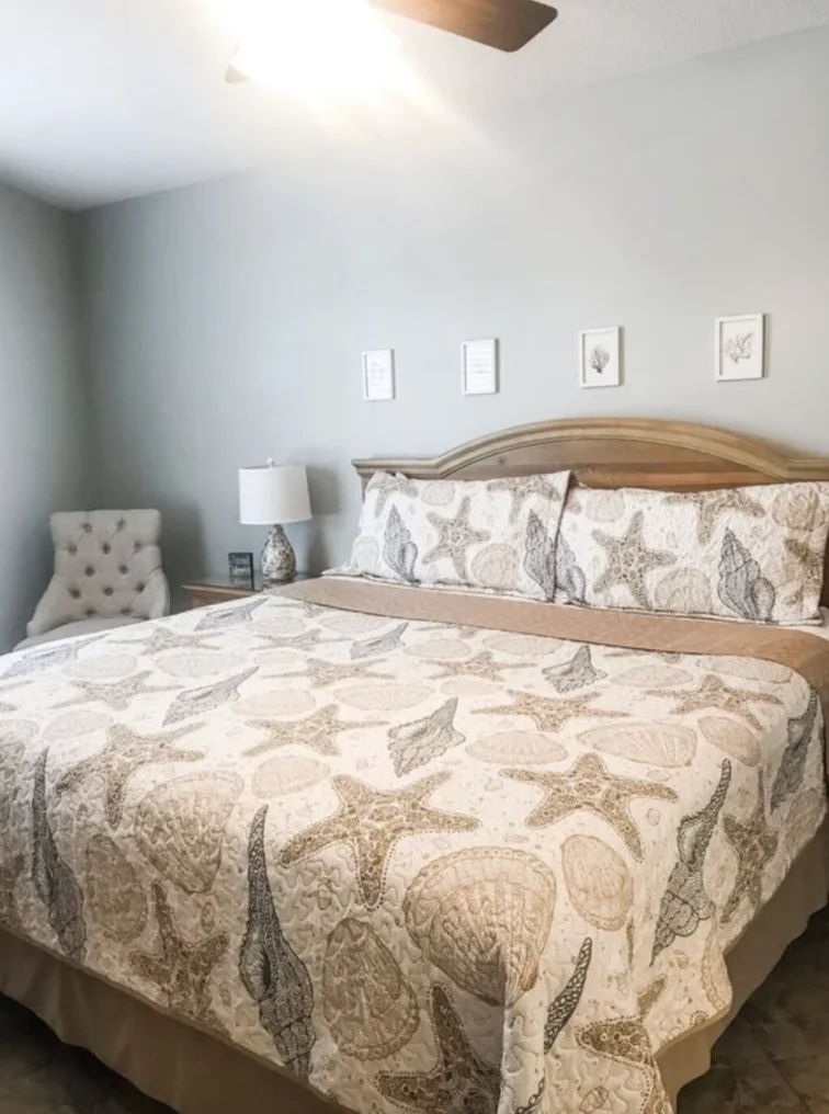 Second bedroom with king size bed, side tables, dresser, TV & access to bathroom