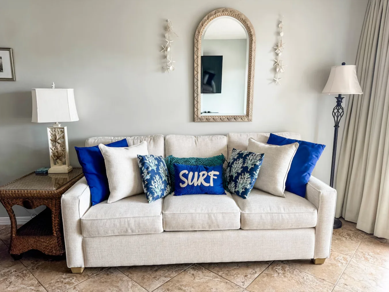 Brand new sofa bed. There are also 3 more chairs for additional seating in the living room