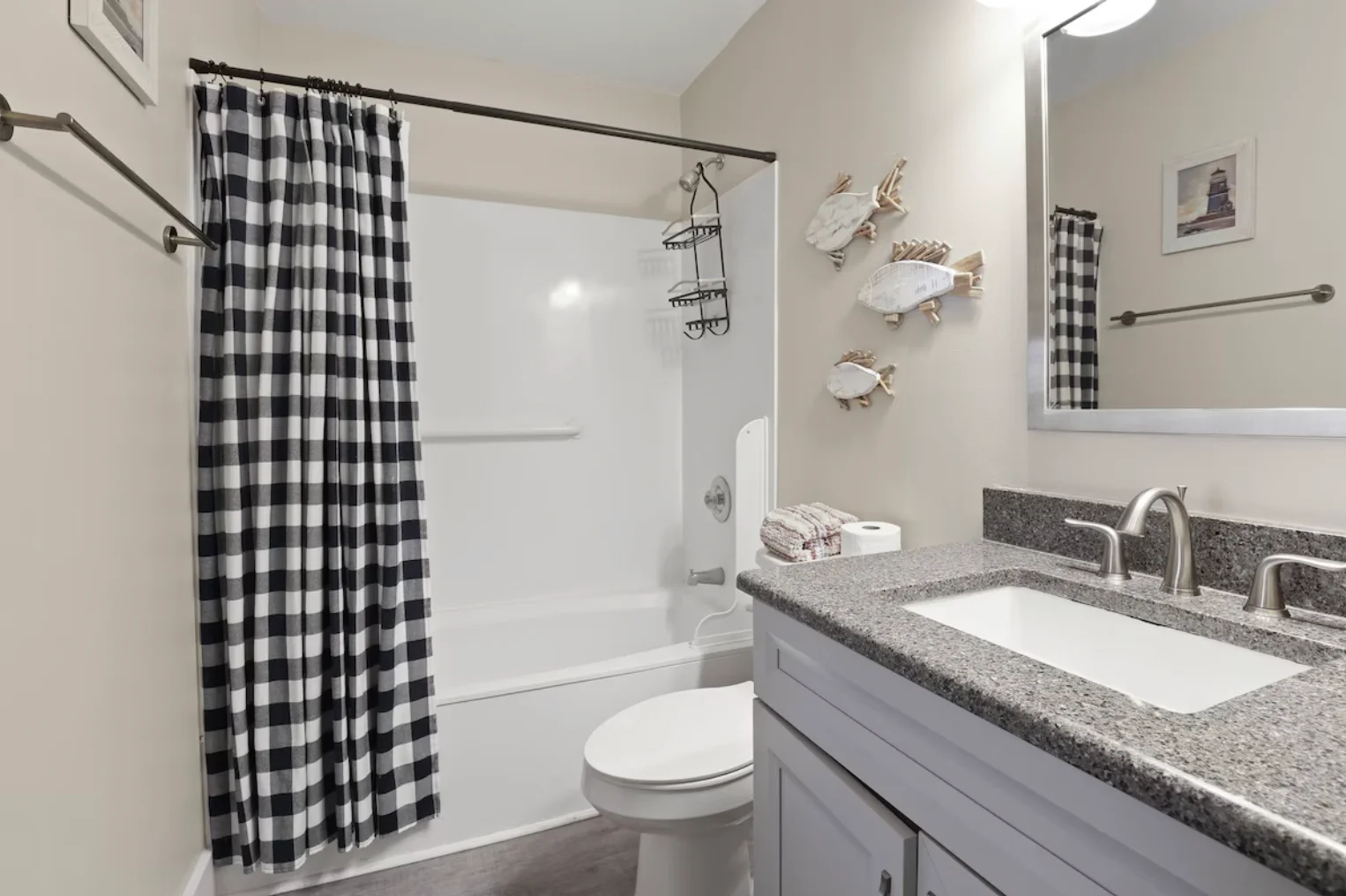 The guest bathroom is a tub/shower combination.