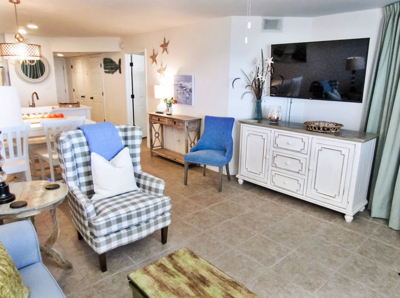 The living room has a large Smart TV