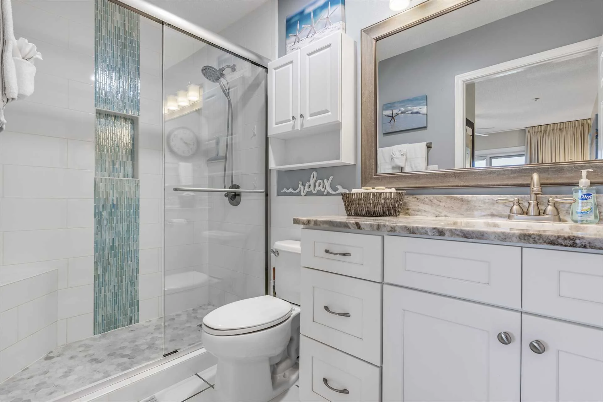 Updated master bath en-suite with walk in shower and granite counter top vanity 